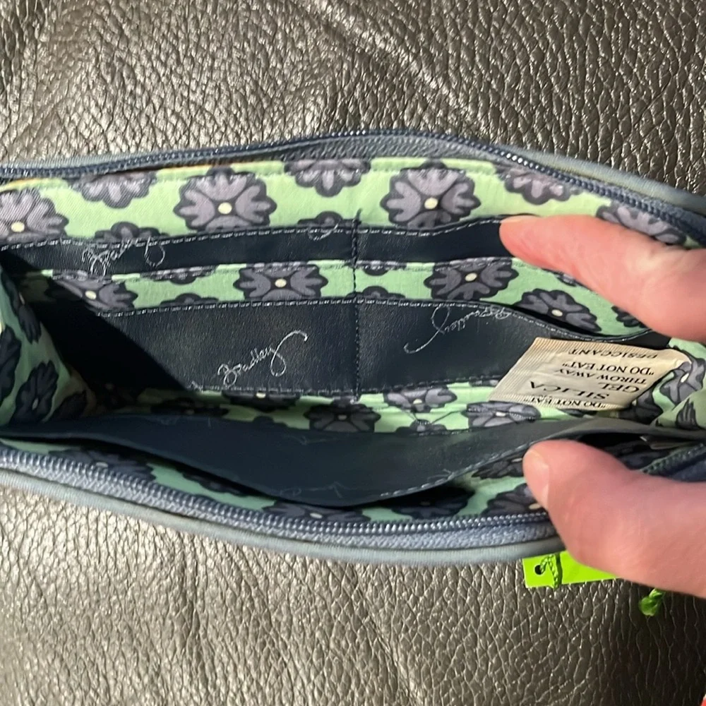 Vera Bradley front zip wallet in nomadic floral
